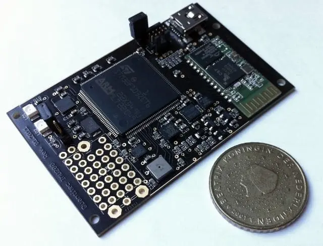 MEMS microfluidics compared to a coin